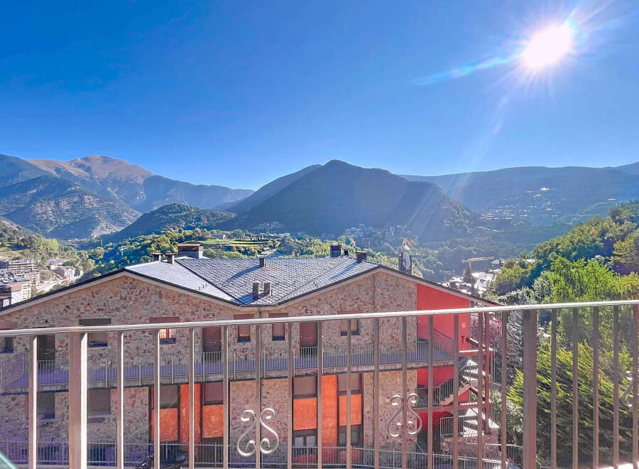 Enjoy breathtaking mountain views from this charming property.