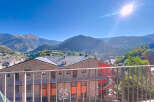 Enjoy breathtaking mountain views from this charming property.