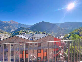 Enjoy breathtaking mountain views from this charming property.
