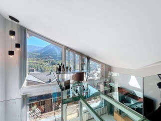 Experience luxury living with this stunning property, featuring a modern design and breathtaking mountain views.