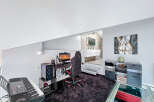 Discover modern living in this stylish property, featuring a dedicated gaming setup perfect for entertainment.