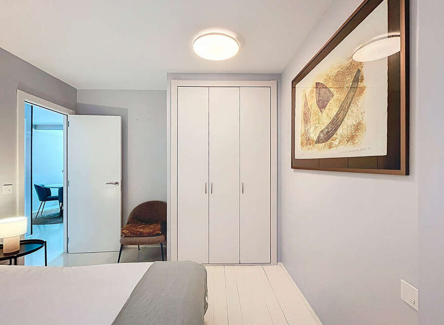 Discover the charm of this beautifully designed bedroom, featuring a modern aesthetic and ample natural light.