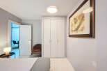 Discover the charm of this beautifully designed bedroom, featuring a modern aesthetic and ample natural light.