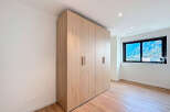 Discover this stunning property featuring a modern wardrobe with ample storage space.