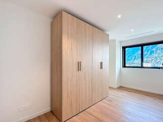 Discover this stunning property featuring a modern wardrobe with ample storage space.