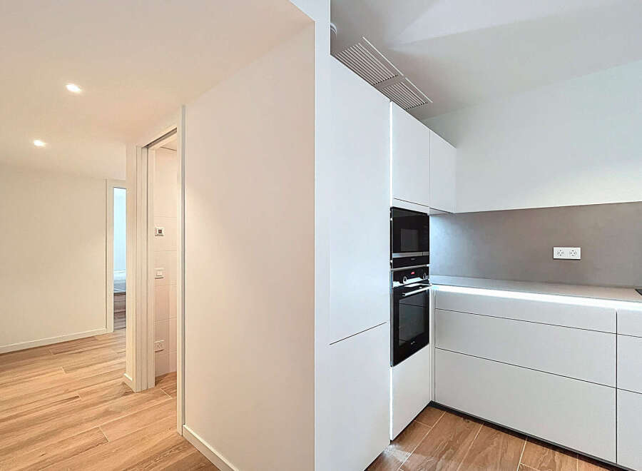 Discover modern living in this stunning property! Featuring a sleek, contemporary kitchen with integrated appliances and ample storage, perfect for culinary enthusiasts.