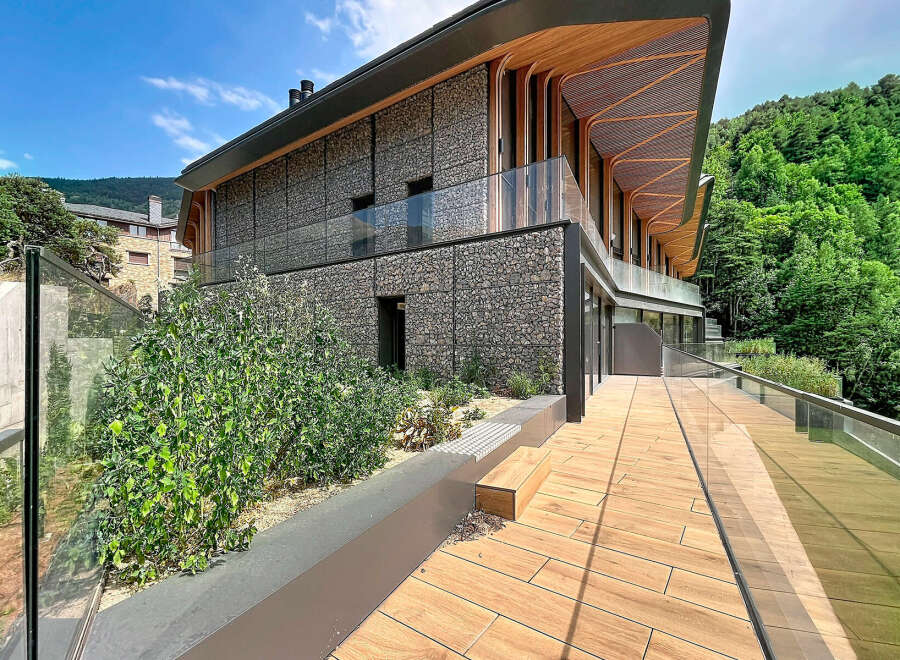Experience modern luxury nestled in nature with this stunning property.