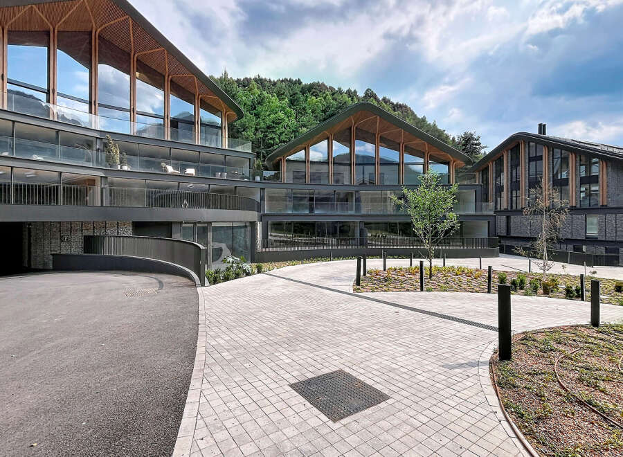 Discover modern luxury living in this stunning architectural masterpiece, featuring expansive glass windows that flood the interiors with natural light and offer breathtaking mountain views.