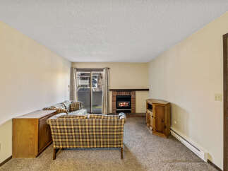 Cozy living room featuring a fireplace, perfect for relaxing evenings.