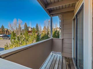 Enjoy stunning views from this charming balcony! This property features a spacious outdoor area, perfect for relaxing and taking in the scenery.