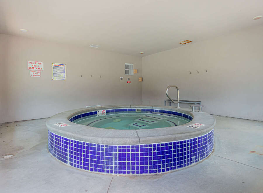 Enjoy a relaxing soak in this inviting spa, perfect for unwinding after a long day.
