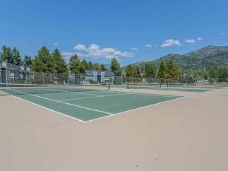 Enjoy the active lifestyle with this property's fantastic tennis courts, perfect for residents and guests alike.