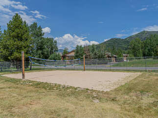 Enjoy outdoor recreation at this beautiful volleyball court! This well-maintained court offers a perfect setting for friendly matches or competitive games.