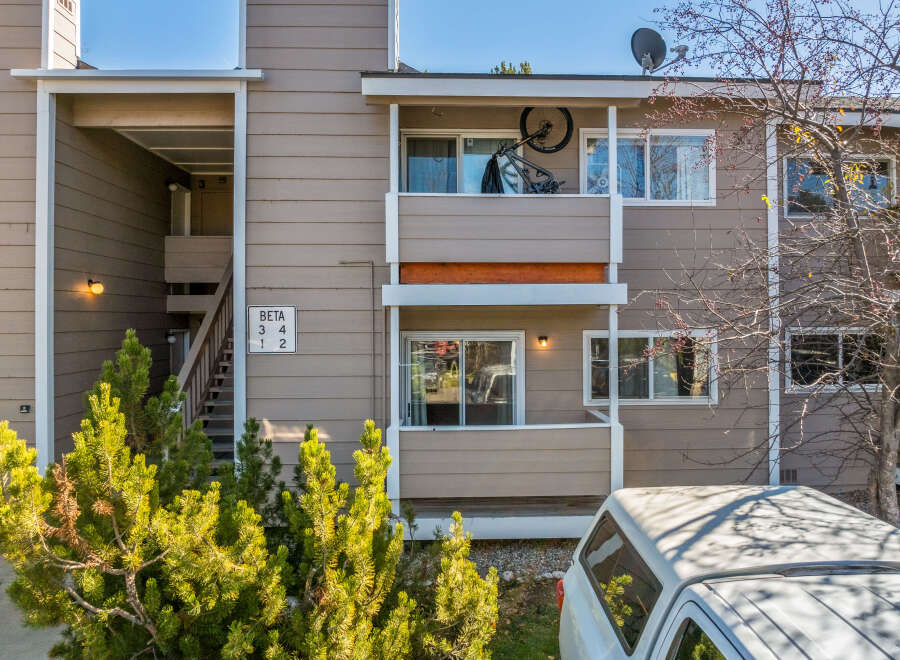 This charming two-story apartment complex offers a blend of comfort and convenience.