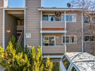 This charming two-story apartment complex offers a blend of comfort and convenience.