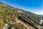 Nestled amidst the majestic mountains, this property offers unparalleled views and a serene escape.