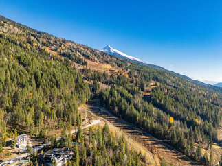 Nestled amidst the majestic mountains, this property offers unparalleled views and a serene escape.