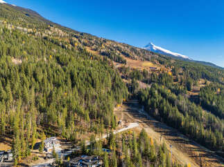 Nestled amidst the majestic mountains, this property offers an unparalleled living experience.