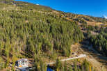 Nestled amidst the majestic mountains, this stunning property offers unparalleled views and a serene escape.