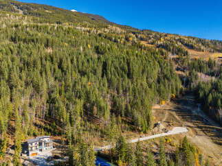 Nestled amidst the majestic mountains, this stunning property offers unparalleled views and a serene escape.