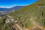 Nestled amidst the stunning natural beauty of the mountains, this property offers an unparalleled living experience.