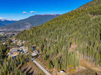 Nestled amidst the stunning natural beauty of the mountains, this property offers an unparalleled living experience.