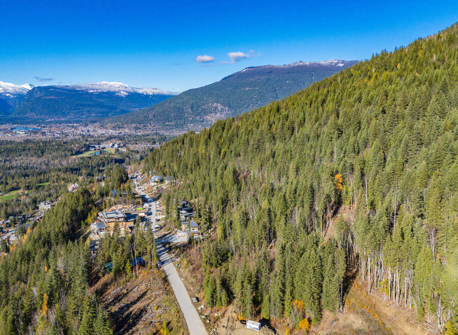 Discover the tranquility of mountain living with this stunning property nestled amidst lush greenery.