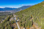 Discover the tranquility of mountain living with this stunning property nestled amidst lush greenery.