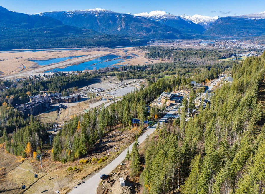 This stunning property offers breathtaking views of the surrounding mountains and valleys.