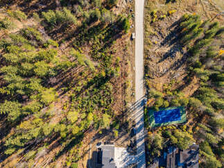 Discover a stunning property nestled in a serene, wooded area, offering a perfect blend of nature and luxury.