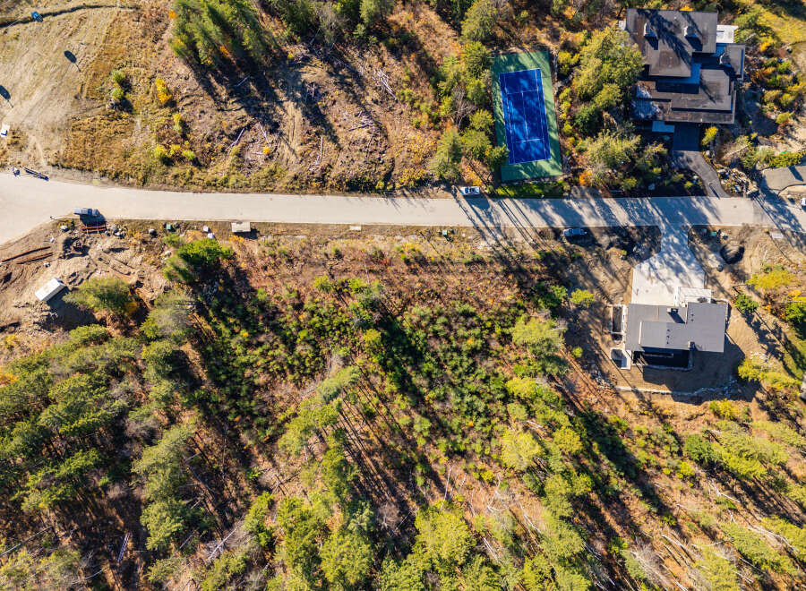 Discover a stunning property nestled in a serene, wooded area, offering a perfect blend of luxury and nature.