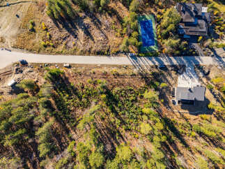 Discover a stunning property nestled in a serene, wooded area, offering a perfect blend of luxury and nature.