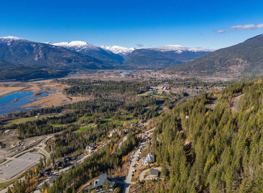 Discover breathtaking mountain views and lush greenery in this stunning aerial shot.