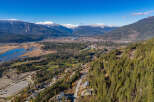 Discover breathtaking mountain views and lush greenery in this stunning aerial shot.