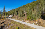 Discover a stunning property nestled in a serene, wooded area, offering a perfect blend of nature and modern living.