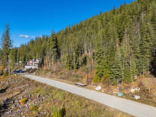 Discover a stunning property nestled in a serene, wooded area, offering a perfect blend of nature and modern living.