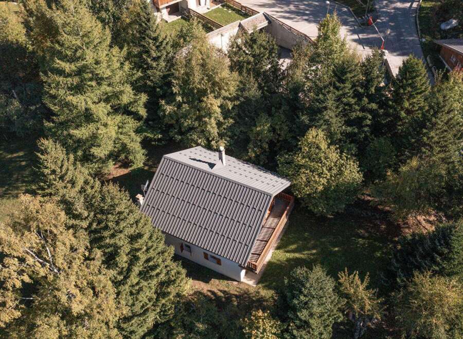 Nestled amidst lush greenery, this charming cabin offers a serene escape.