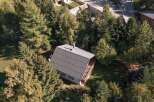 Nestled amidst lush greenery, this charming cabin offers a serene escape.