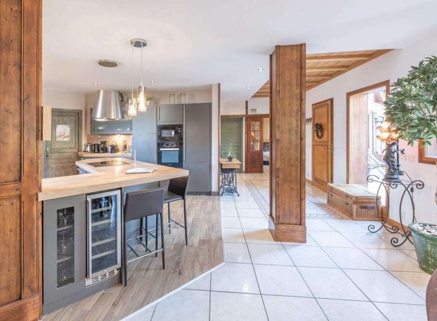 This stunning property boasts a beautifully designed kitchen with modern appliances and a stylish breakfast bar, perfect for entertaining.