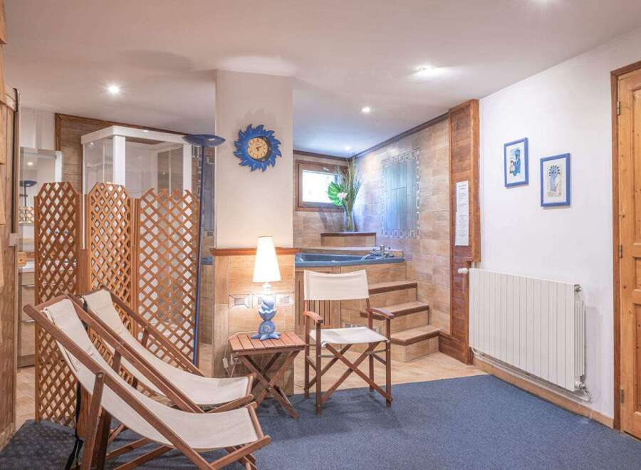Discover a serene spa retreat in this inviting space, perfect for relaxation and rejuvenation.