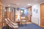 Discover a serene spa retreat in this inviting space, perfect for relaxation and rejuvenation.
