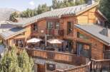 Discover the charm of this stunning wooden chalet, nestled in a picturesque setting.