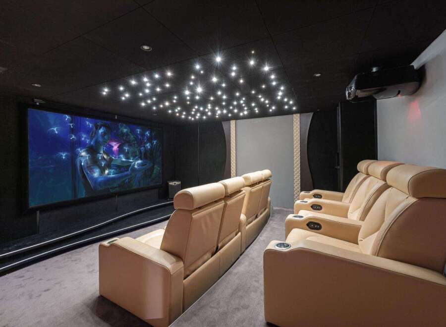Experience luxury and entertainment in this stunning home theater.
