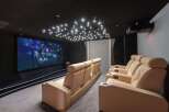 Experience luxury and entertainment in this stunning home theater.