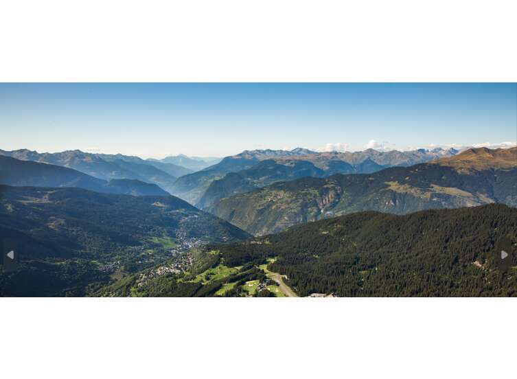 Experience breathtaking views from this stunning property nestled in the mountains.