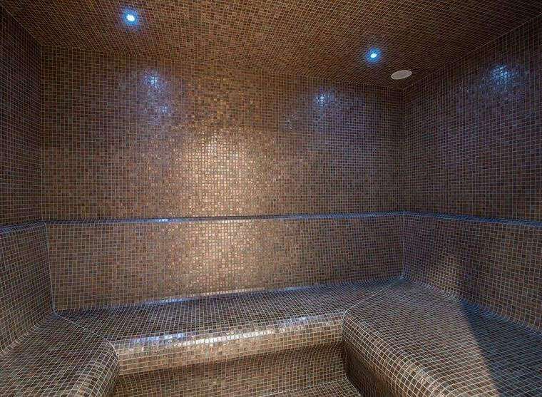 Step into luxury with this stunning steam room, meticulously designed for ultimate relaxation.