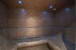 Step into luxury with this stunning steam room, meticulously designed for ultimate relaxation.