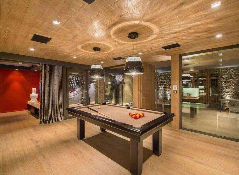 Step into luxury with this stunning property featuring a dedicated game room.