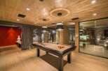 Step into luxury with this stunning property featuring a dedicated game room.