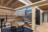 This stunning property boasts a unique blend of rustic charm and modern design, perfect for those seeking a luxurious living space.